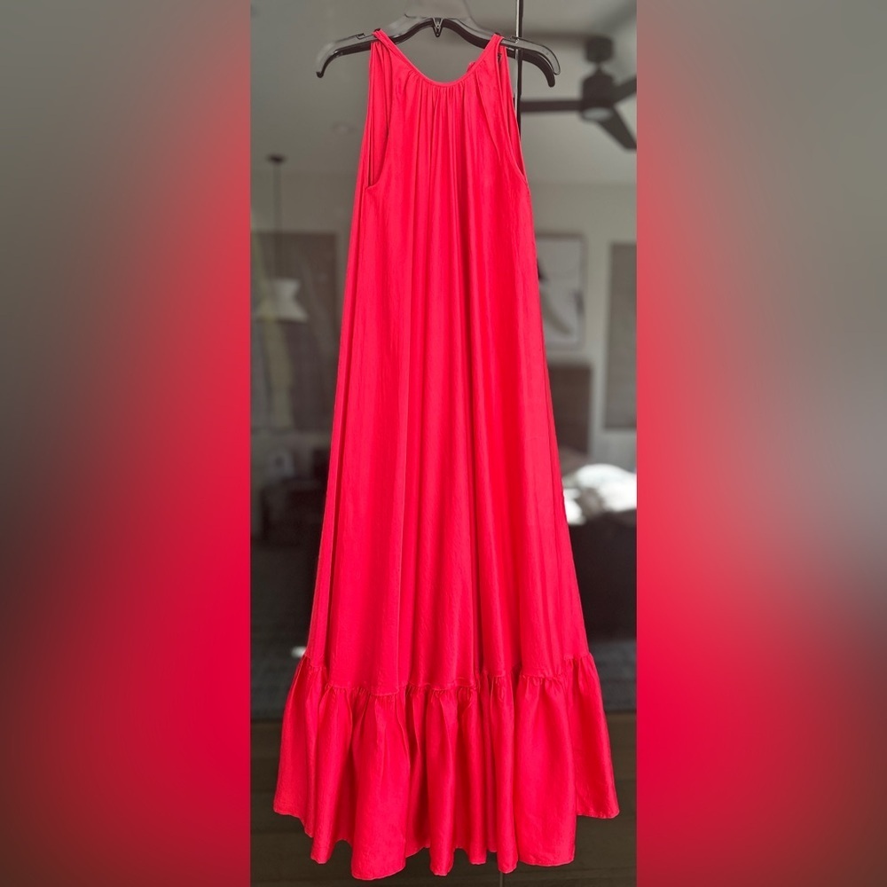 Red satin maxi dress with ruffle bottom. Size M. Unlined. Worn only once.